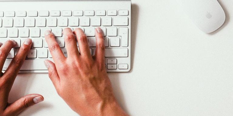 Hands on computer keyboard 