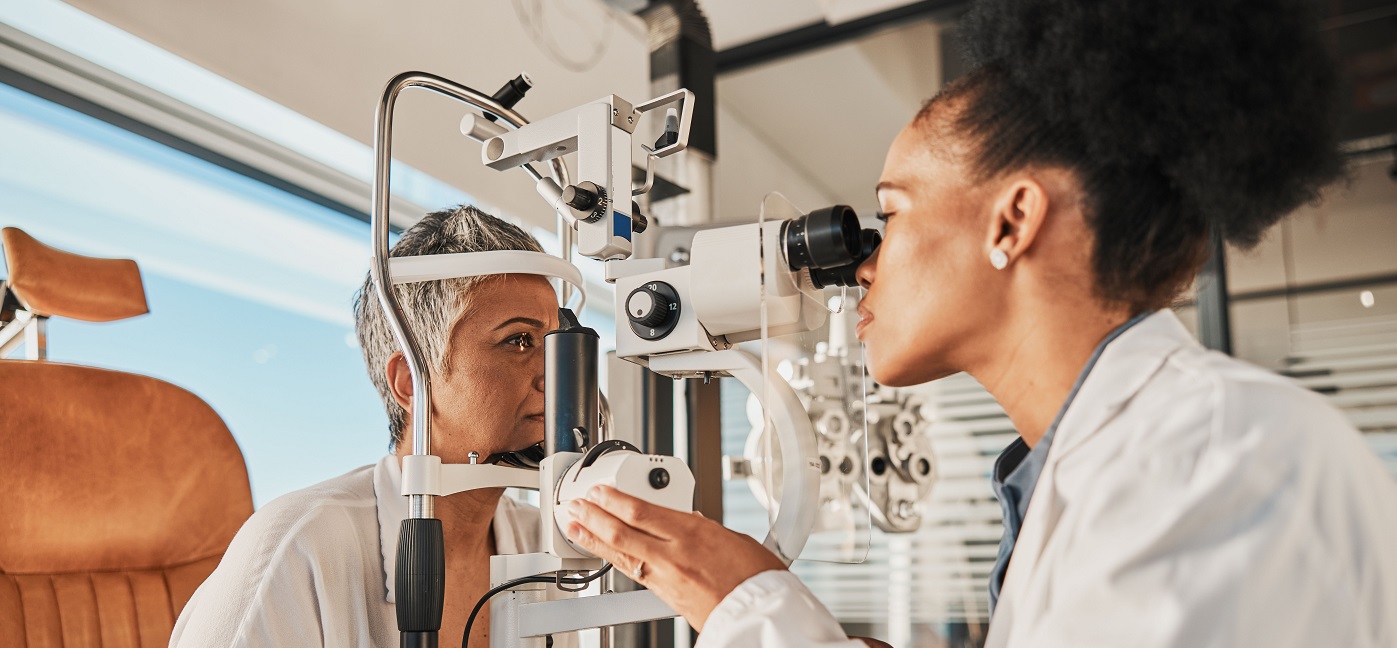 A health care professional testing a patients vision in a clinic setting