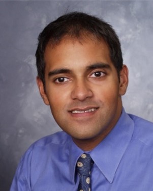 Photo of a smiling Aloke Chatterjee